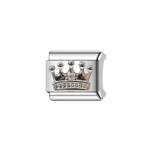 Close-up of stainless steel Italian charm link with elegant raised crown design detail