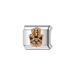 Detailed view of a stainless steel Italian charm link with a golden Hamsa hand motif.