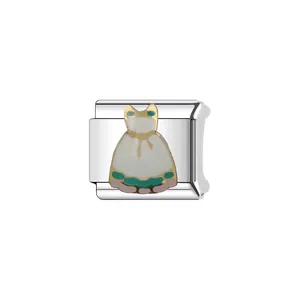 Detailed view of Italian modular charm featuring a white enamel dress design
