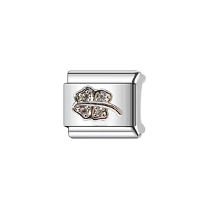Detailed view of Italian style modular charm with sparkling four-leaf clover design