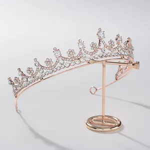Close-up of elegant rose gold bridal tiara with sparkling crystal embellishments