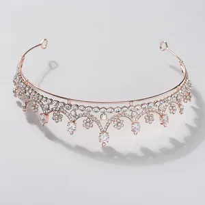 Close-up of elegant rose gold bridal tiara with sparkling crystal flower patterns