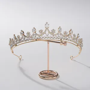 Detail shot of an elegant rose gold bridal tiara crown with sparkling rhinestones