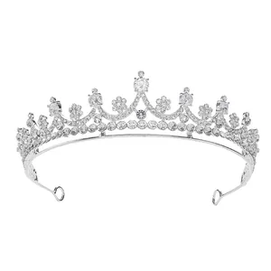 Elegant bridal silver tiara crown with sparkling crystals for wedding hair accessories.