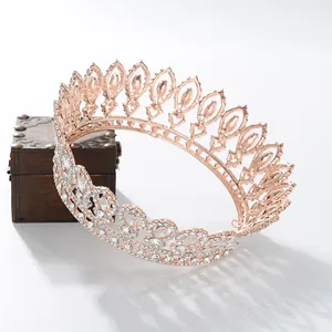 Detailed close-up view of a Baroque circular bridal crown with rose gold plating and crystals
