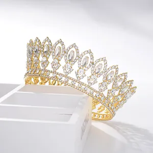 Elegant gold Baroque bridal crown with sparkling rhinestone crystals for weddings.