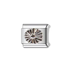 Detail view of a silver stainless steel Italian charm with embossed daisy flower