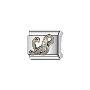 Detailed view of silver stainless steel Italian charm with a sparkling crystal letter