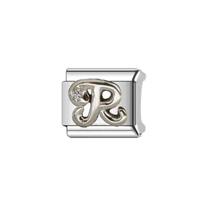 Macro detail of a silver stainless steel Italian charm link featuring a cursive letter R