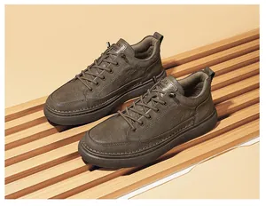 Detailed side view of men's olive green genuine leather casual sneakers with thick soles
