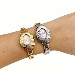Orologi al quarzo unici a forma di pesce volante per coppie con eleganti quadranti ovali rosa