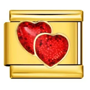 Detailed close-up of a gold stainless steel Italian charm link with red glitter hearts.