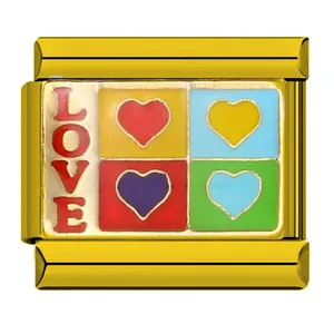 Macro view of gold stainless steel DIY bracelet link featuring LOVE and colorful hearts