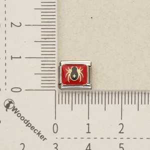 Detailed macro shot of a red and black spider charm for DIY Italian modular bracelet jewelry