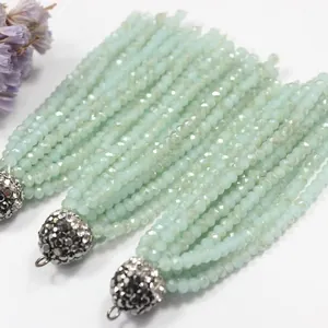 Elegant mint green faceted crystal tassel charms with sparkling rhinestone caps for DIY jewelry