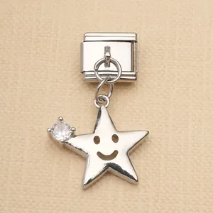 Close-up of silver stainless steel star smiley charm with rhinestone for modular bracelets