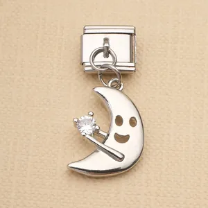 Macro view of silver stainless steel Italian modular charm with smiling moon design