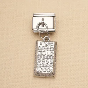 Detailed view of silver stainless steel Italian charm with FINE GOLD bar design for bracelets