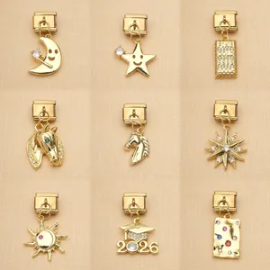 Detailed view of various gold-plated stainless steel Italian modular charm bracelet links.