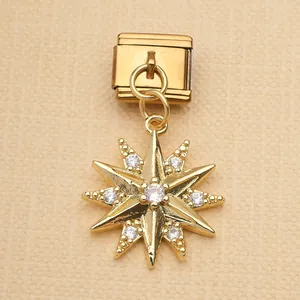 Detailed view of gold-tone stainless steel star charm with clear crystals for Italian modular bracelets