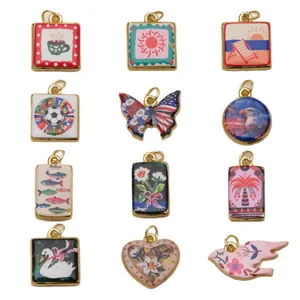 Assorted copper enamel pendants with butterfly heart and nature motifs for DIY jewelry