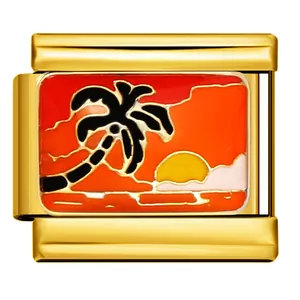 Detailed view of gold Italian charm featuring a vibrant red sunset and palm tree
