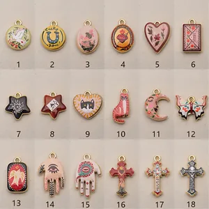Detailed view of 18 artistic retro copper pendants with various enamel motifs