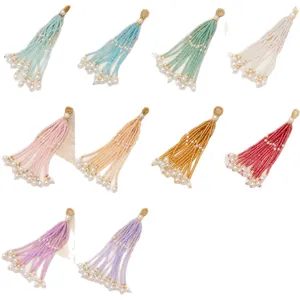 Multicolor beaded tassel pendants with elegant pearls for jewelry and phone charms.