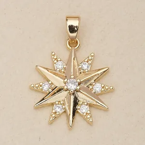 Close-up of a gold-colored starburst pendant featuring brilliant white stone accents