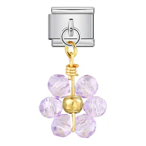Close-up detail of Italian charm link with a lavender crystal flower pendant decoration