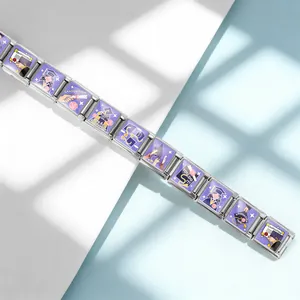 Detailed macro view of purple Italian charm bracelet featuring graduation theme charms