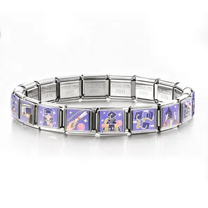 Detailed macro shot of a stainless steel Italian link bracelet featuring graduation theme charms
