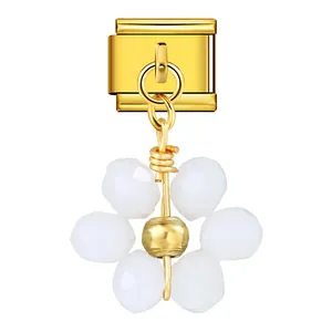 Close-up detail of white crystal bead flower pendant for Italian modular charm bracelet.