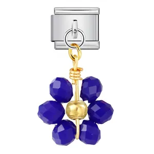 Detailed close-up of dark blue crystal flower charm for Italian modular bracelets