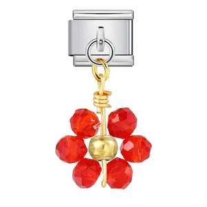 Detail view of red faceted crystal flower charm for Italian modular steel bracelets