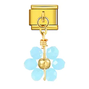 Italian charm bracelet link with light blue crystal flower dangle in gold finish