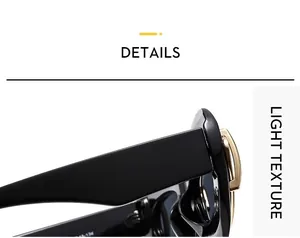 Detailed view of fashionable cat-eye sunglasses featuring elegant gold metal hinge and V logo