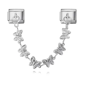 Detailed view of silver-tone butterfly charm hanging chain for Italian modular bracelet links
