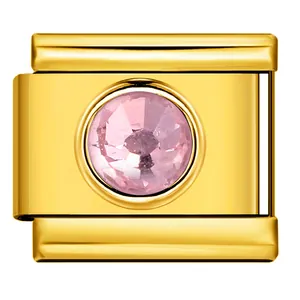 Gold-plated Italian modular charm link featuring a pink round-cut crystal centerpiece