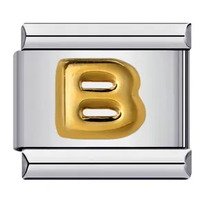 Macro detail of a stainless steel Italian charm link with a raised gold-plated letter B