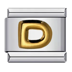 Close-up of a gold-plated letter D on a stainless steel Italian charm bracelet link.