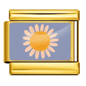 Close-up detail of a gold Italian modular charm link featuring a painted daisy flower design