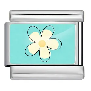 Close-up of a stainless steel Italian charm featuring a white flower on a blue background