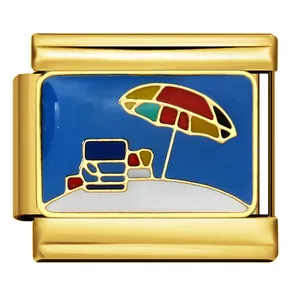 Close-up of gold Italian charm link with colorful beach umbrella enamel design.