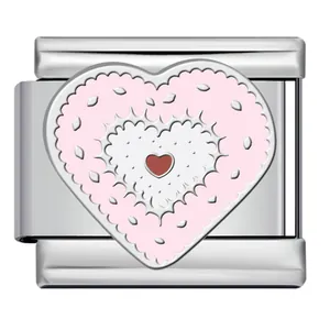 Detail view of a stainless steel Italian charm with pink and white layered heart design