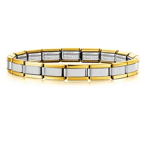 Close-up of gold and silver two-tone stainless steel Italian modular charm bracelet.
