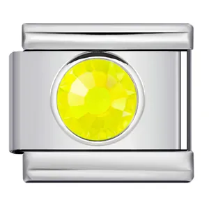 Close-up of silver stainless steel charm link with faceted yellow crystal stone