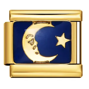 Detailed view of golden Italian charm link featuring blue enamel star and moon motifs