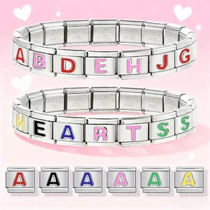 Detailed view of the Italian modular charm bracelet with colorful enamel letters