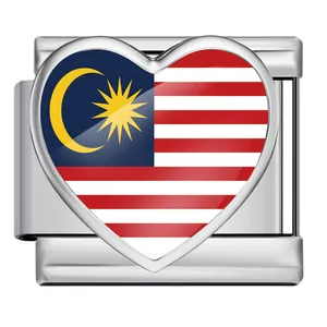 Detailed macro view of heart-shaped Malaysia flag charm on stainless steel Italian link